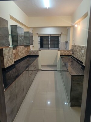 Kitchen in 3 BHK Apartment at Queens Manor Apartment, Shivaji Nagar – for Sale