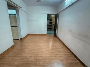 Room in 1 BHK Apartment at Rajnigandha CHS Vasant Vihar, Vasant Vihar – for Rent