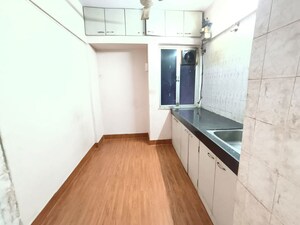 Kitchen in 1 BHK Apartment at Rajnigandha CHS Vasant Vihar, Vasant Vihar – for Rent