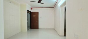 Living Room in 1 BHK Apartment at Raunak Bliss, Ghodbunder Road – for Rent