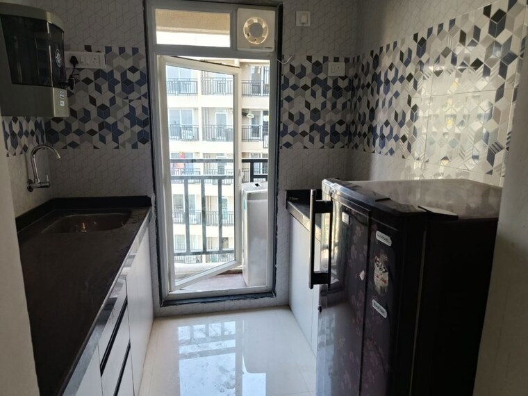 Kitchen, raunak-bliss-thane 1 Bedroom 500 Sq.Ft. Apartment In Ghodbunder Road Thane 10312151