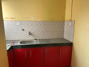 Bedroom in 3 BHK Builder Floor at Beltola Tiniali Bus Stop – for Rent