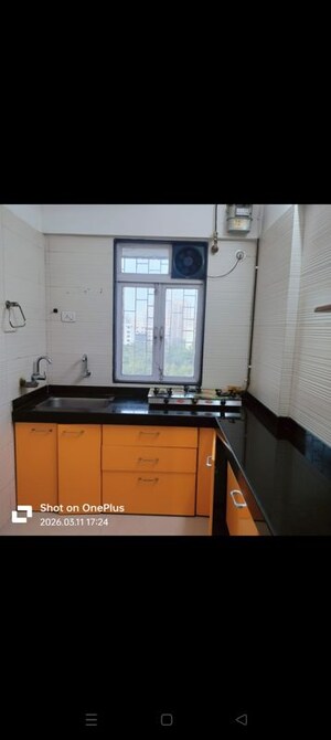 Kitchen in 1 BHK Apartment at Cosmos Classique, Ghodbunder Road – for Sale