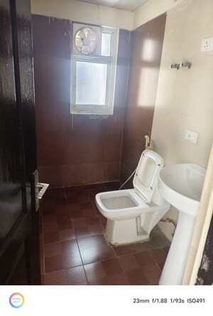 Bathroom in 2 BHK Apartment at Aims Golf City, Sector 75 – for Sale
