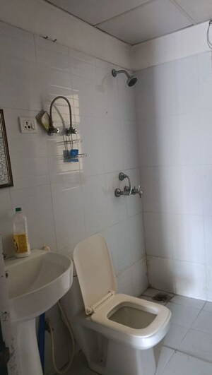 Bathroom in 2 BHK Apartment at Aims Golf City, Sector 75 – for Sale