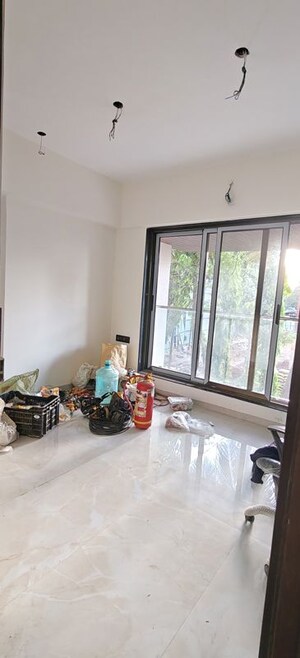 Living Room in 2 BHK Apartment at Gowda Palash, Malad West – for Rent