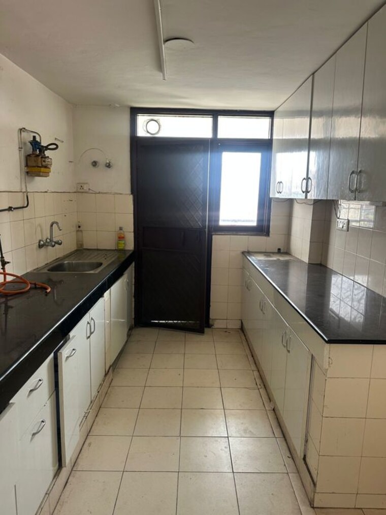Kitchen, cghs-sahyog-apartments 2 Bedroom 1500 Sq.Ft. Apartment In Sector 56 Gurgaon 10312531
