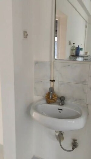 Bathroom in 2 BHK Apartment at Mhada Apartments, Goregaon East – for Rent