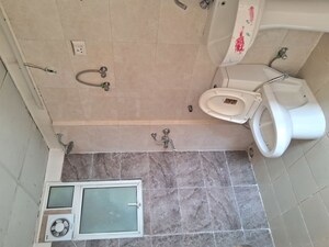 Bathroom in 2 BHK Apartment at Mittal Rajnagar Residency, Raj Nagar Extension – for Sale