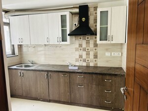 Kitchen in 2 BHK Apartment at Unitech The Residences Gurgaon, Sector 33 – for Sale