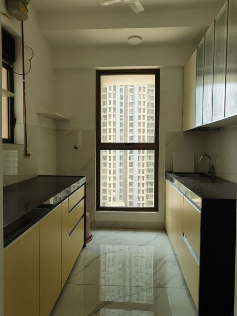 Kitchen, raymond-ten-x-habitat 1 Bedroom 450 Sq.Ft. Apartment In Pokhran Road No Two Thane 10312672