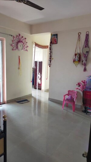 Living Room in 1 BHK Apartment at Viraj Bahule Township, Fursungi – for Sale