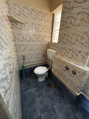 Bathroom in 2 BHK Apartment at Riddhi Garden, Malad East – for Rent