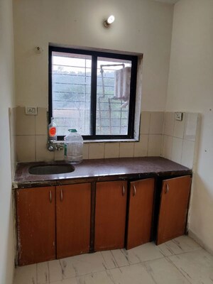 Kitchen in 2 BHK Apartment at Garden View Apartment, Goregaon East – for Rent