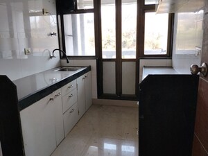 Kitchen in 2 BHK Apartment at Anand Heights, Wadala – for Sale