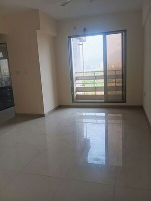 Living Room in 2 BHK Apartment at Gami  Amar Harmony, Taloja – for Rent