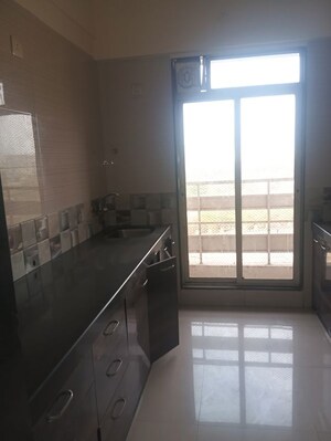 Kitchen in 2 BHK Apartment at Gami  Amar Harmony, Taloja – for Rent