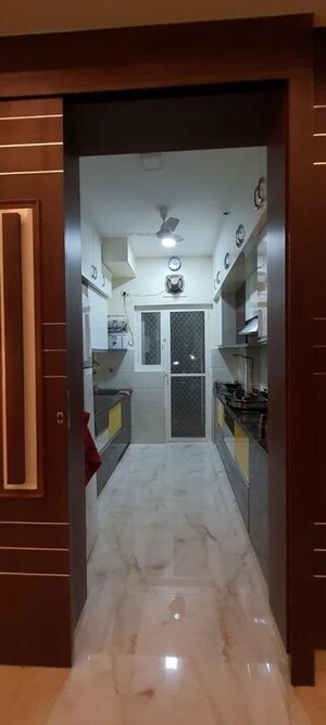 Kitchen in 3.5 BHK Apartment at Purvanchal Royal Park, Sector 137 – for Sale