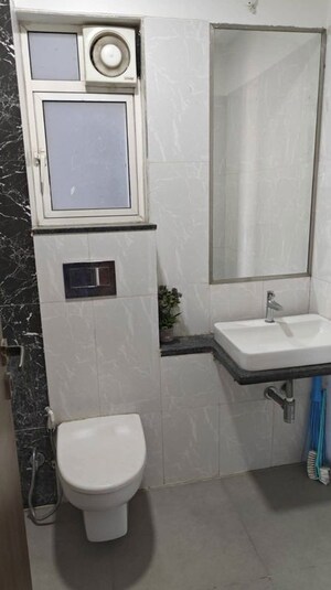 Bathroom in 2 BHK Apartment at Omkar Ananta, Goregaon East – for Rent