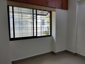 Bedroom in 2 BHK Apartment at Rachana Shree Apartment, Dahanukar Colony – for Rent