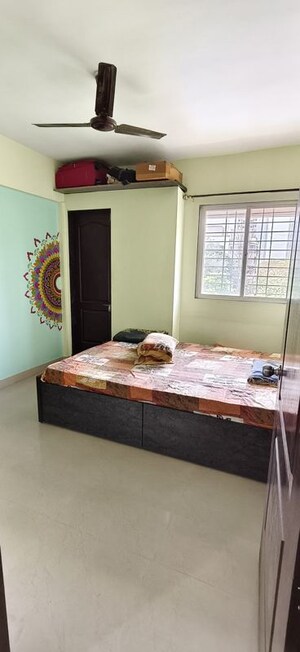 Bedroom in 1 BHK Apartment at Wadgaon Sheri – for Rent