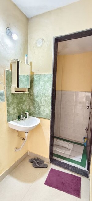 Bathroom in 1 BHK Apartment at Wadgaon Sheri – for Rent