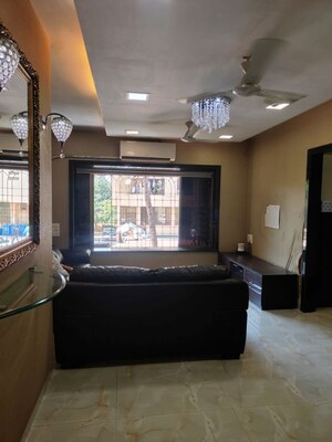 Bedroom in 2 BHK Apartment at Wood Rose CHS, Andheri West – for Rent