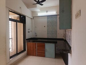 Kitchen in 2 BHK Apartment at Miracle Heights, Kopar Khairane – for Sale
