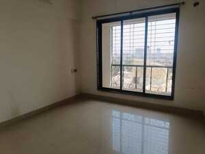 Master Bedroom in 2 BHK Apartment at Miracle Heights, Kopar Khairane – for Sale