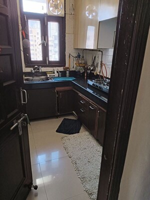 Kitchen in 3 BHK Apartment at CGHS HEWO Apartments, Sector 56 – for Sale