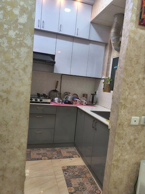 Kitchen in 2 BHK Apartment at Gaur City 2, Sector 16c Greater Noida – for Rent