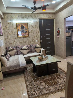 Living Room in 2 BHK Apartment at Gaur City 2, Sector 16c Greater Noida – for Rent