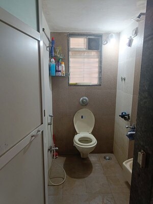 Bathroom in 2 BHK Apartment at Om Manusmruti  CHS, Thane West – for Rent