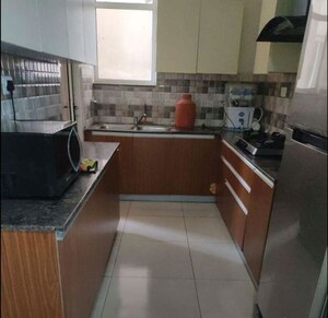 Kitchen in 3 BHK Apartment at Sushma Chandigarh Grande, Lohgarh – for Rent