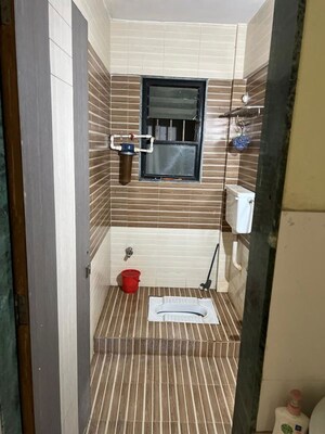 Bathroom in 2 BHK Apartment at Ganesh Nakshatram, Dhayari – for Sale