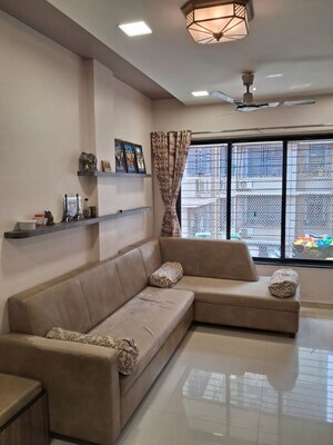 Living Room in 2 BHK Apartment at Dahisar East – for Sale