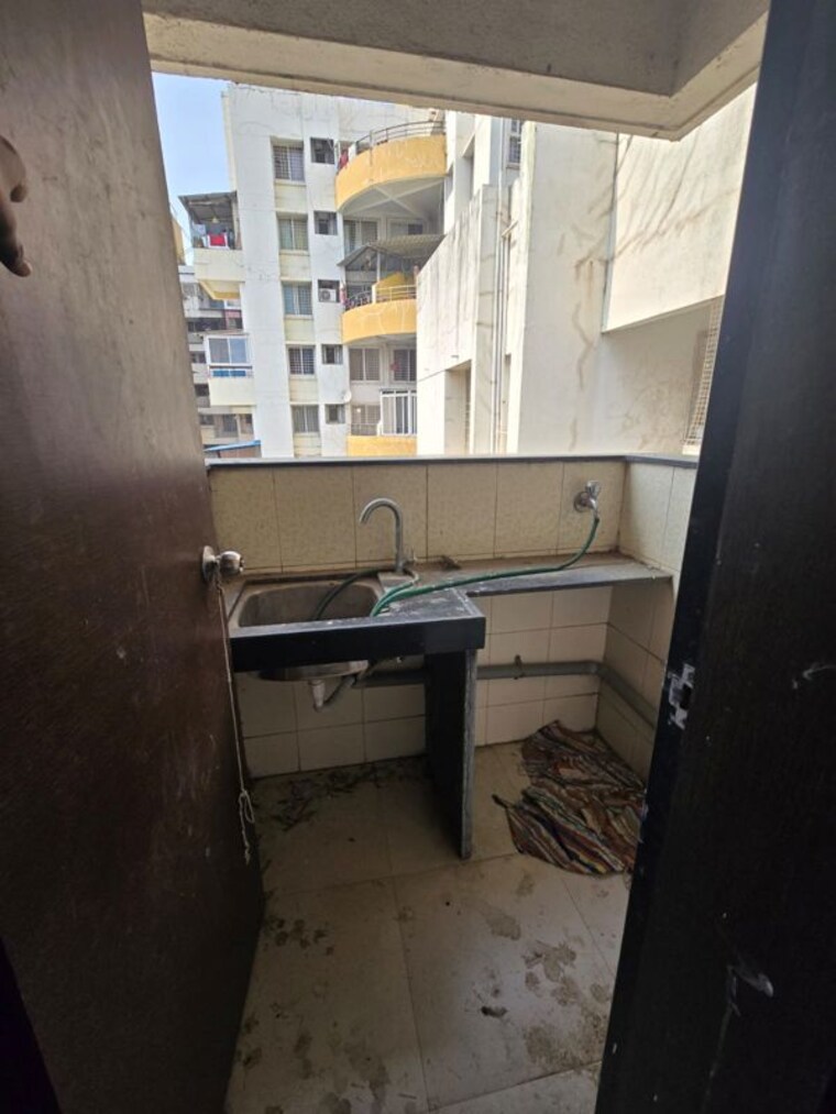 Kitchen, shree-venkatesh-serenity 2 Bedroom 980 Sq.Ft. Apartment In Dhayari Pune 10313404