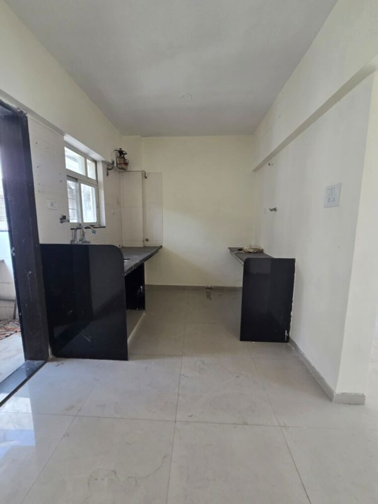 Kitchen, shree-venkatesh-serenity 2 Bedroom 980 Sq.Ft. Apartment In Dhayari Pune 10313404