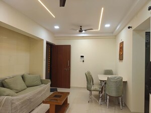 Living Room in 1 BHK Apartment at Raunak Bliss Thane, Ghodbunder Road – for Sale