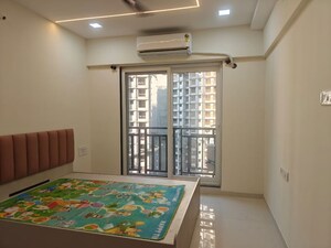 Bedroom in 1 BHK Apartment at Raunak Bliss Thane, Ghodbunder Road – for Sale