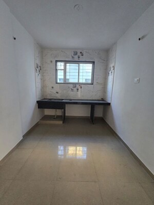 Kitchen in 2 BHK Apartment at Shevantai Angan, Dhayari – for Sale