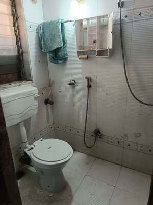 Bathroom in 2 BHK Apartment at Swastik Palms CHS, Brahmand – for Rent