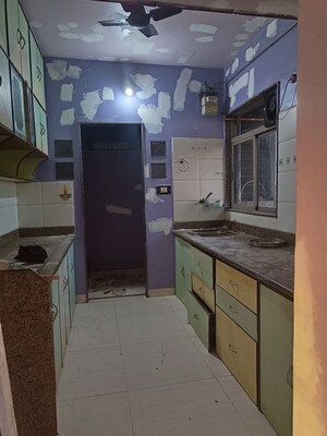 Kitchen in 2 BHK Apartment at Swastik Palms CHS, Brahmand – for Rent