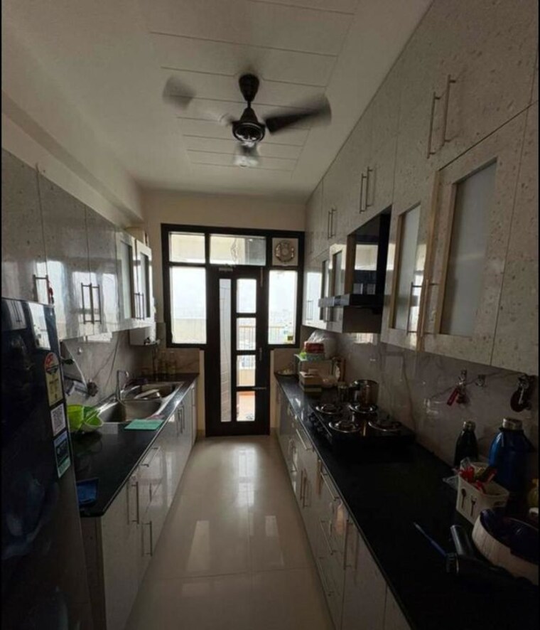 Kitchen, maxxus-elanza 3 Bedroom 1600 Sq.Ft. Apartment In International Airport Road Zirakpur 10313534