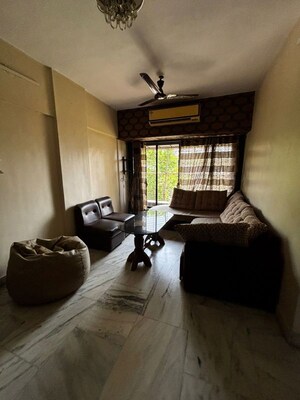 Living Room in 1 BHK Apartment at Riddhi Gardens CHS, Malad East – for Rent