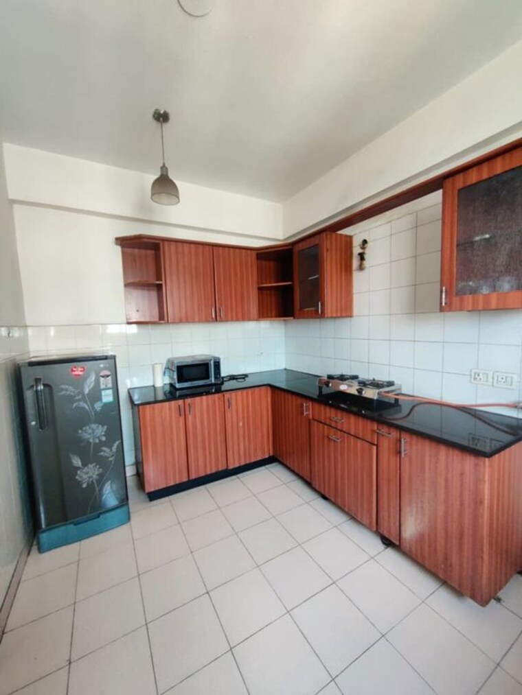 Kitchen, gnida-lohiya-enclave-omicron-1a 2 Bedroom 200 Sq.Mt. Villa In Omicron 1a Greater Noida Greater Noida 10313550