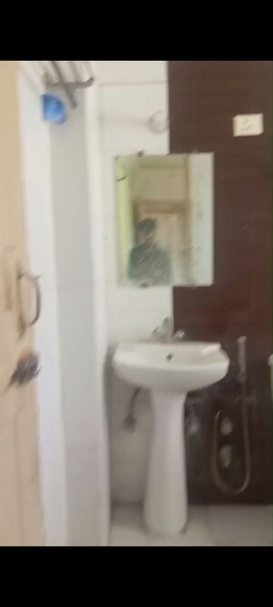 Bathroom in 3 BHK Apartment at Gulmohur Garden, Raj Nagar Extension – for Rent