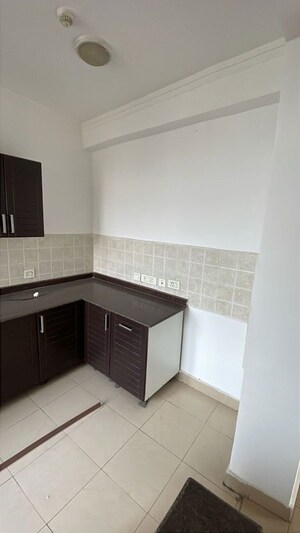 Kitchen in 2 BHK Apartment at Ajnara Le Garden, Sector 16b Greater Noida – for Sale