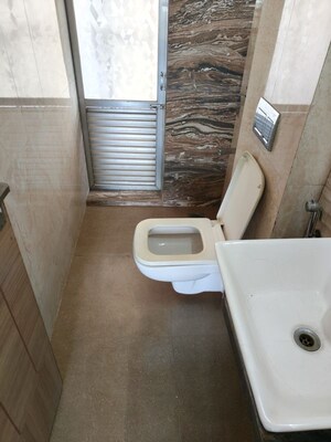 Bathroom in 2 BHK Apartment at Rattan Icon, Seawoods Sector 50 – for Sale