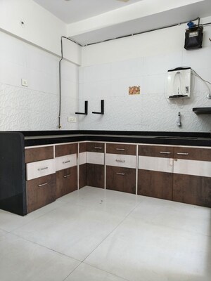 Kitchen in 2 BHK Apartment at Rattan Icon, Seawoods Sector 50 – for Sale